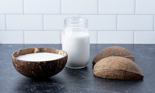 A Jar and Bowl of Fresh Coconut Milk in the USA